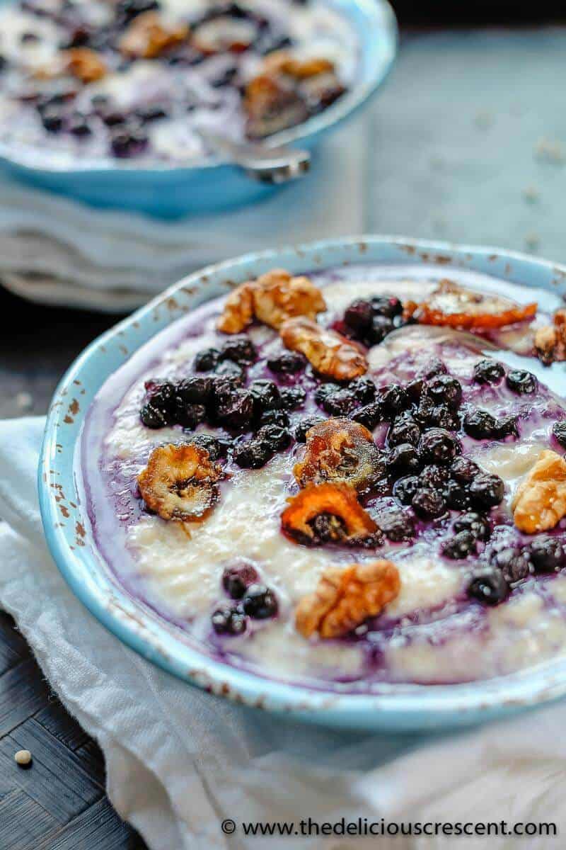 Close up view of porridge with blueberries.