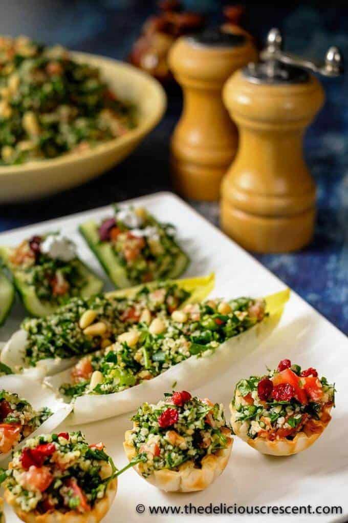 Tabbouleh salad served as a variety of bite sized appetizers
