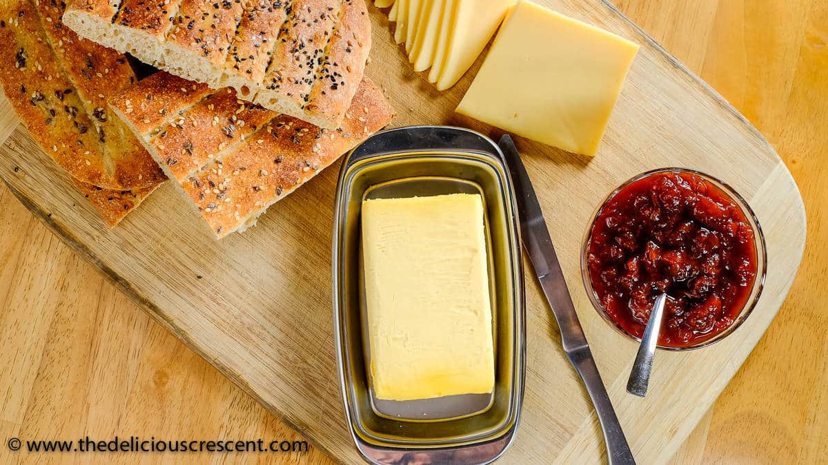 Barbari bread with butter, jam and cheese.