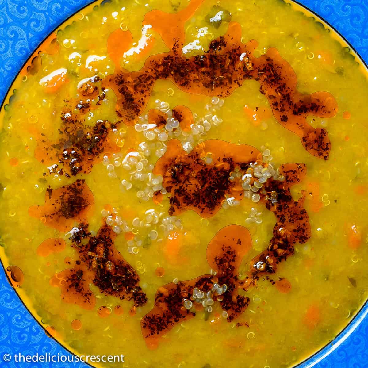 Mediterranean red lentil soup served in a plate.