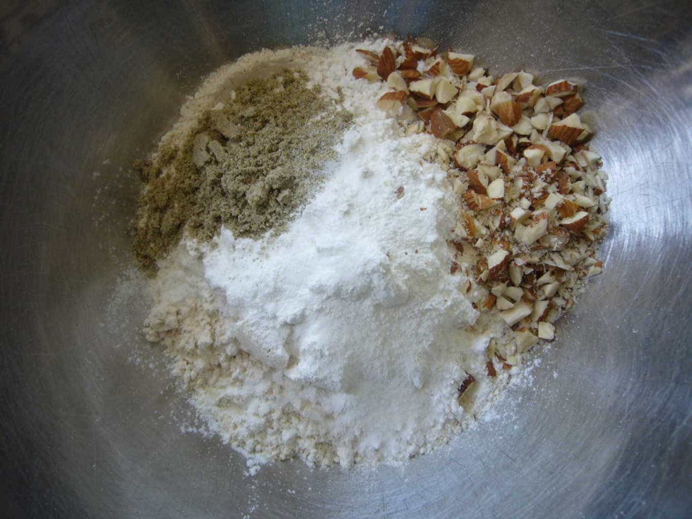 The dry ingredients used for making pancakes with carrots.