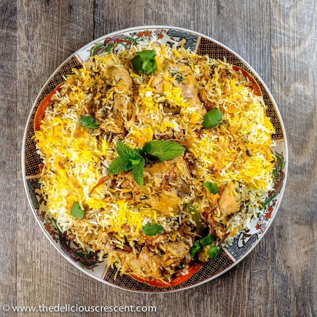 An Indian rice and chicken dish served in a plate.