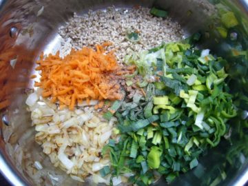 Ingredients used for barley soup placed in the cooking pot.