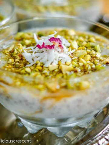 Chia mahalabia, a middle eastern style rice pudding with chia seeds served in a bowl.