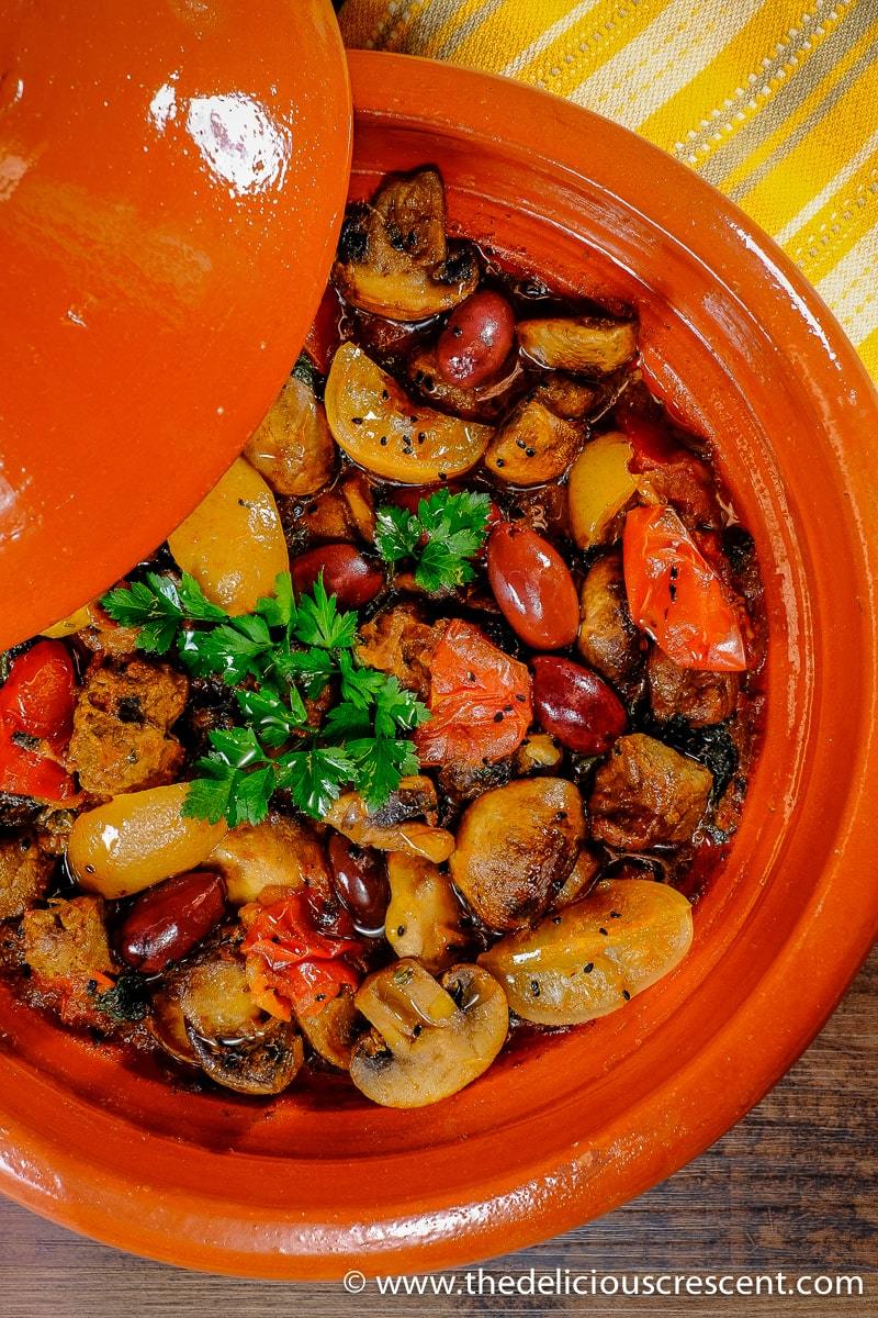 Moroccan lamb stew with mushrooms in a tagine.