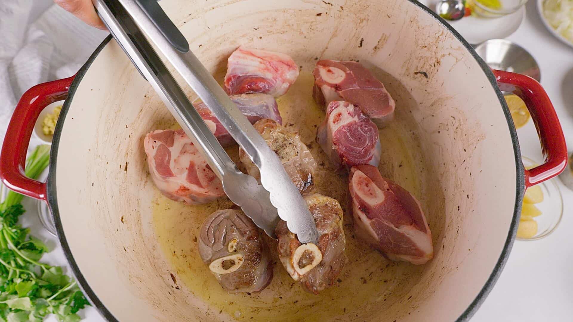 Searing lamb meat.