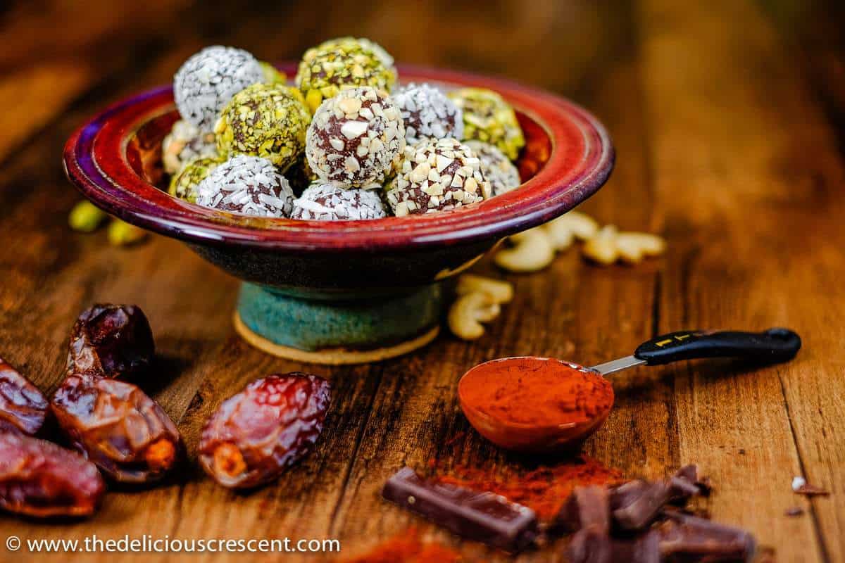 Avocado chocolate truffles with the ingredients around