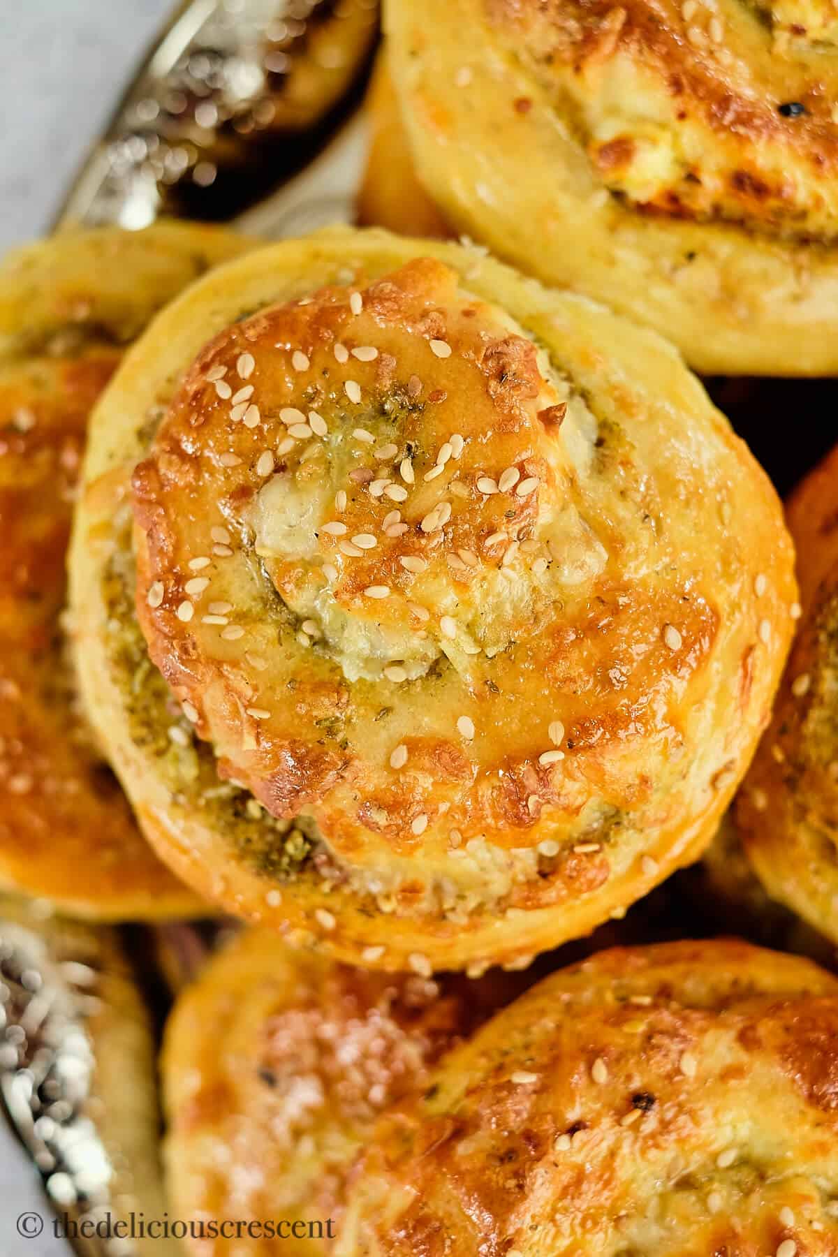 A breakfast roll filled with zaatar and cheese.