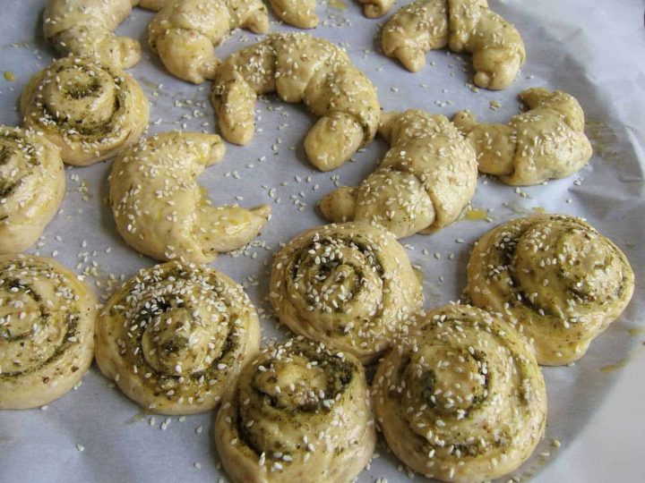 Cheese and zaatar stuffed rolls brushed with egg wash.