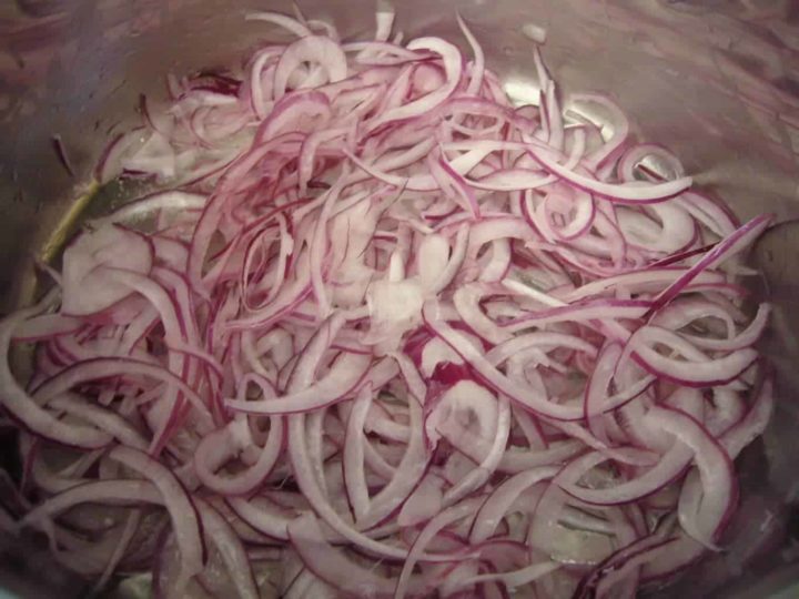 Onions thinly sliced for frying.