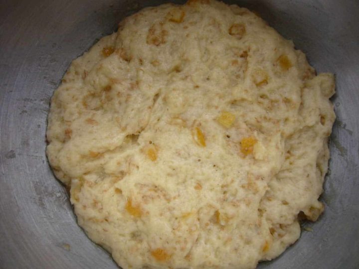 Almond marzipan stollen dough in a mixing bowl.