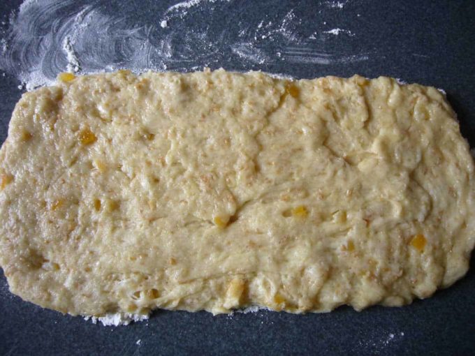 Stollen dough rolled out into a rectangle shape.