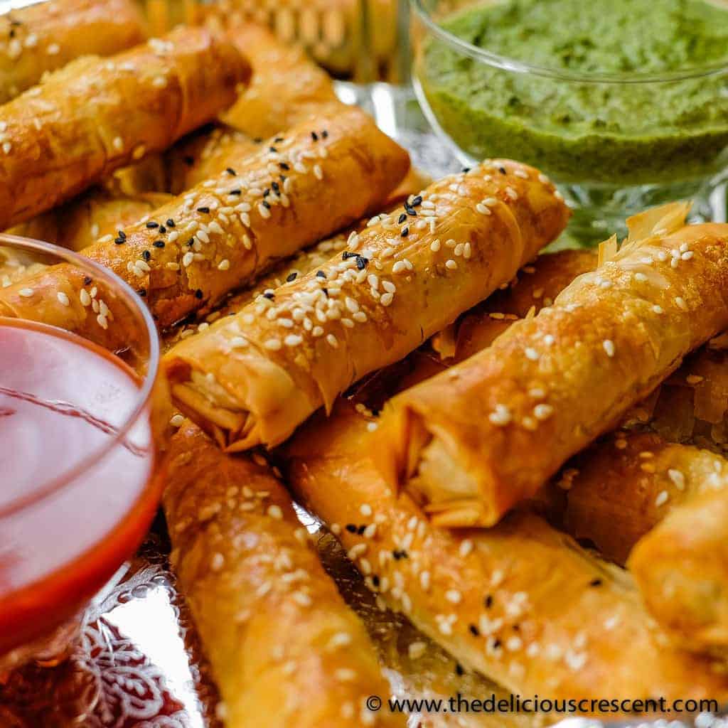 Crispy Potato Edamame Cigar Samosas - an easier and lighter baked version of a hugely popular Indian snack, loaded in flavor and boosted in nutrients. These samosas freeze very well too.