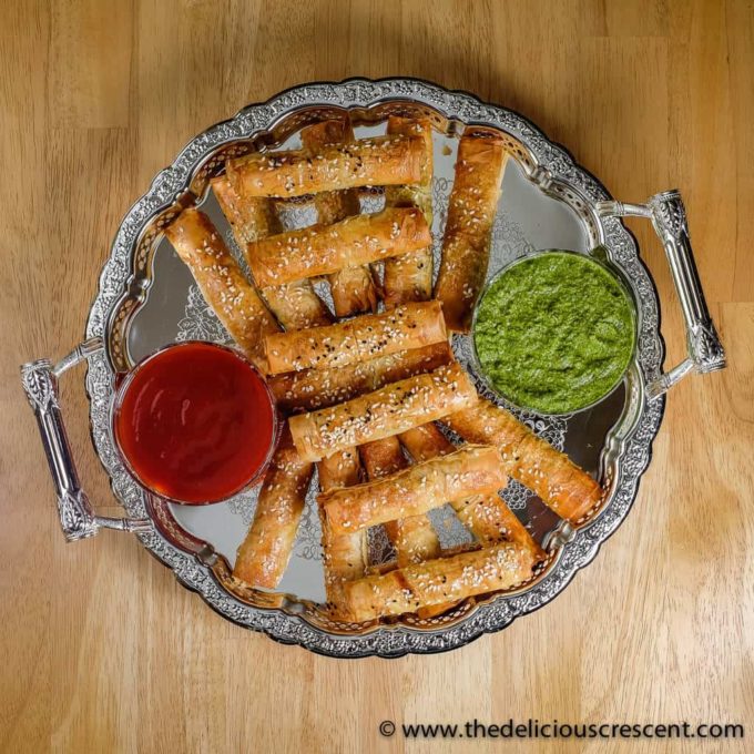 Crispy Potato Edamame Cigar Samosas - an easier and lighter baked version of a hugely popular spicy Indian snack, loaded with flavor and boosted in nutrients. These samosas freeze very well too.