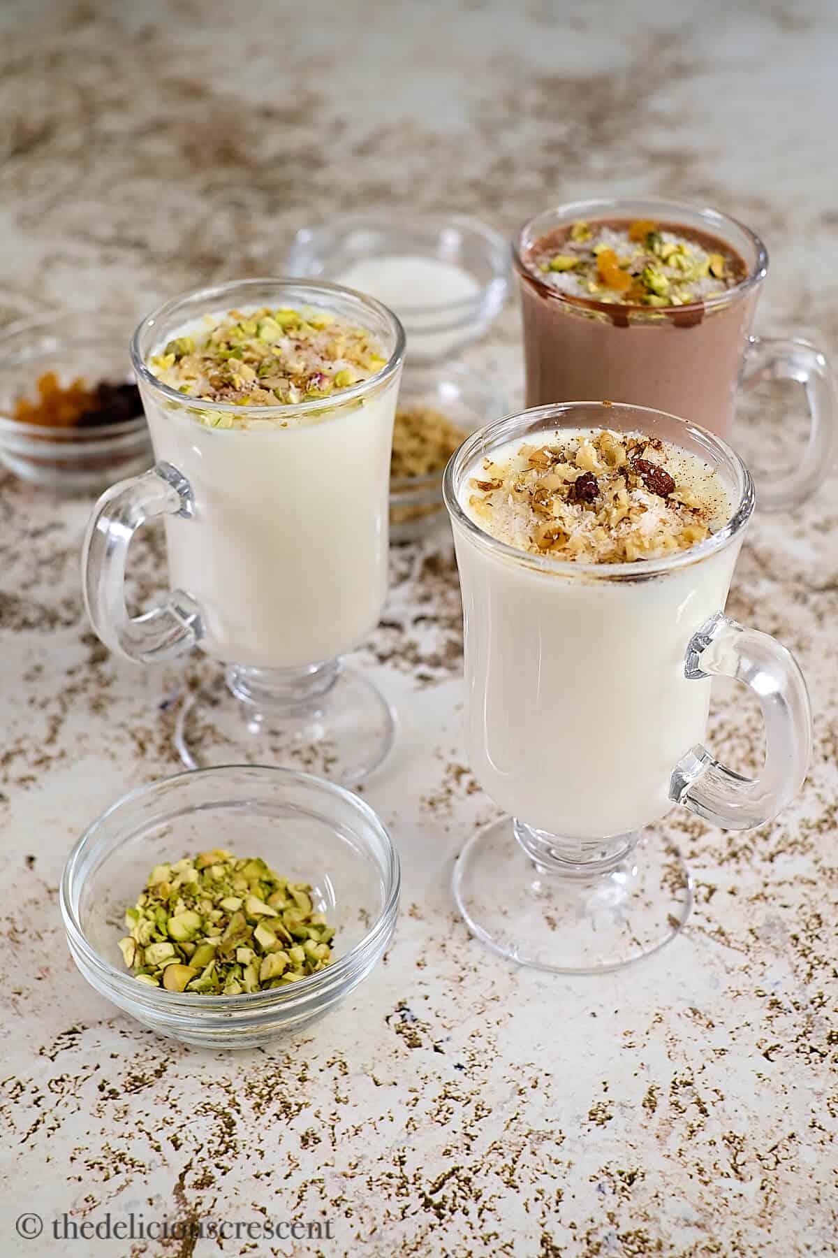Middle eastern thin pudding drink with a variety of toppings.