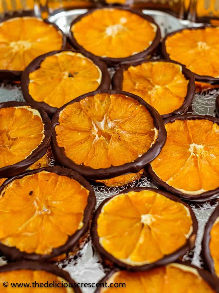 Dark Chocolate Orange Slice Wheels are an elegant treat with decadence in every bite. So easy, healthy and delicious tangy-sweet treat!