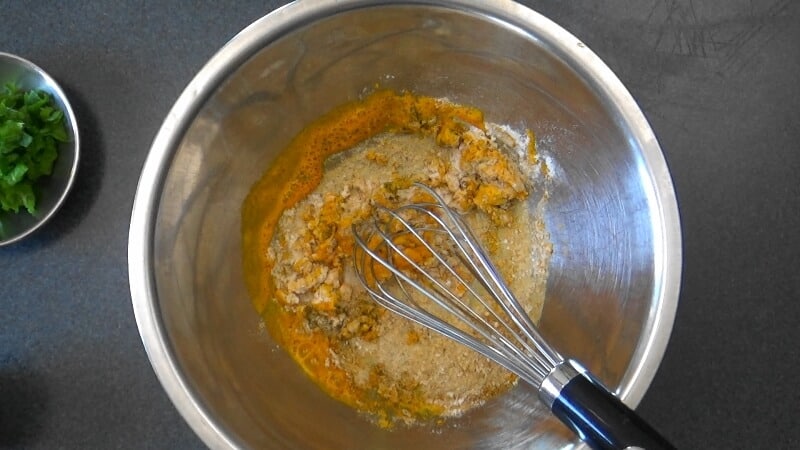 Spices and seasonings being mixed for Persian style omelet.