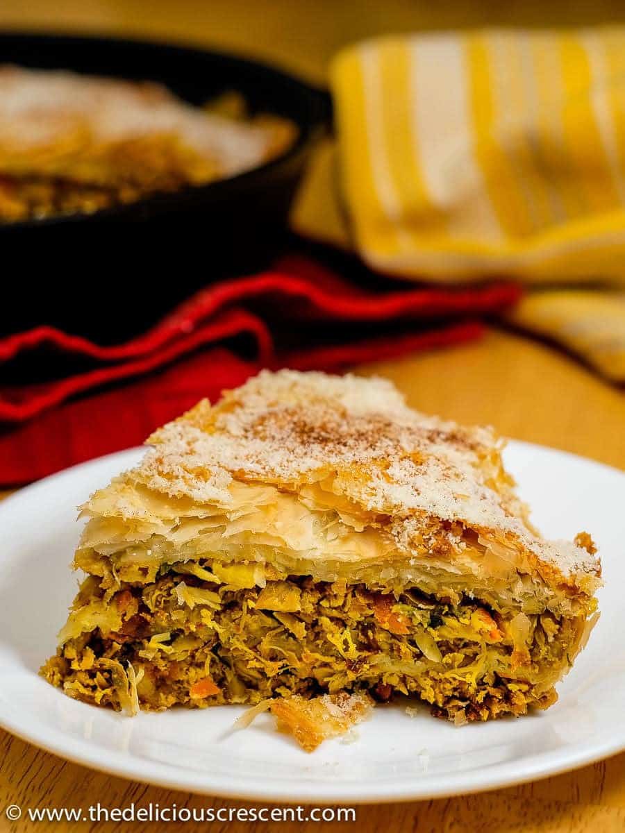 Chicken Pastilla, a scrumptious protein rich Moroccan delicacy, made easy in a skillet. Tender shredded chicken with aromatic spices wrapped in perfectly crisp pastry layers.