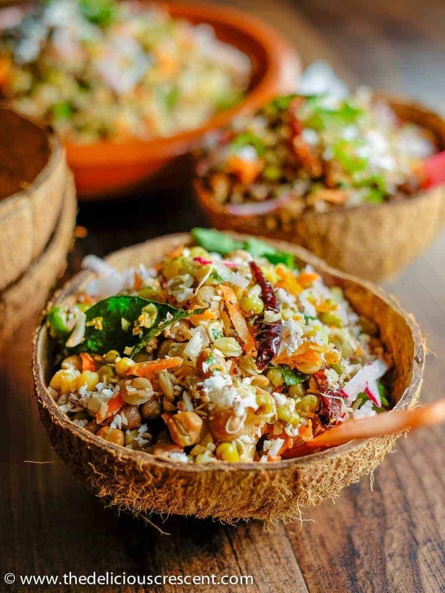 Mixed Sprouts Salad with Coconut, infused with Indian spices has a scrumptious earthy flavor. Sprouting makes the legumes super nutritious and more digestible. With high fiber and plant protein. Vegan and gluten free.