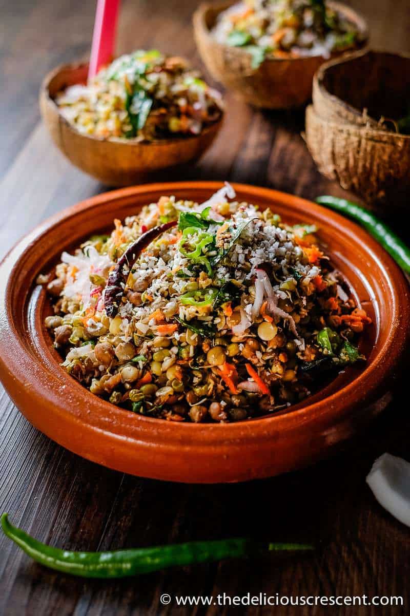 Mixed sprouts with coconut, infused with Indian spices and served on the table.