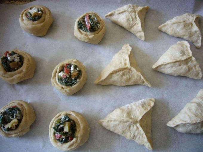Place the Fatayer on a lined baking sheet
