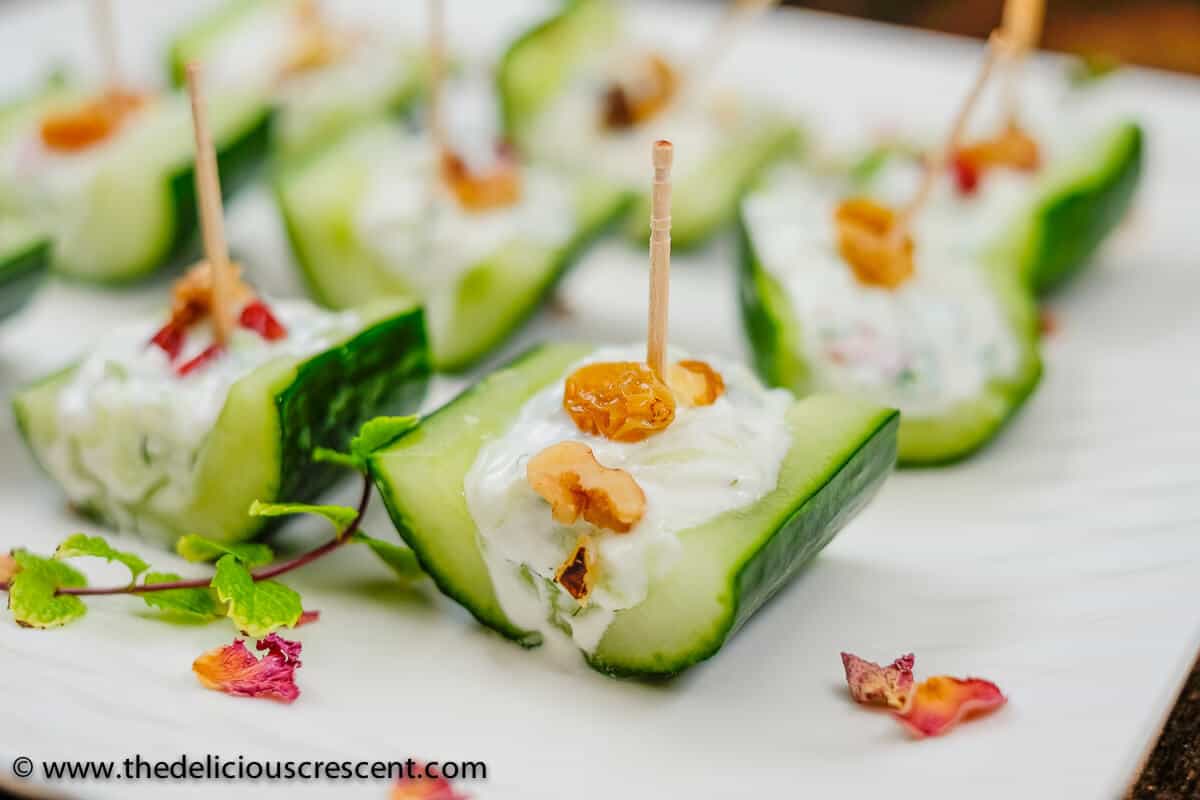Mast-o-khiar is a scrumptious classic Persian salad of cool cucumbers with creamy yogurt, and infused with fragrant herbs. Presented here in two ways - as a traditional salad and in a modern appetizer style.