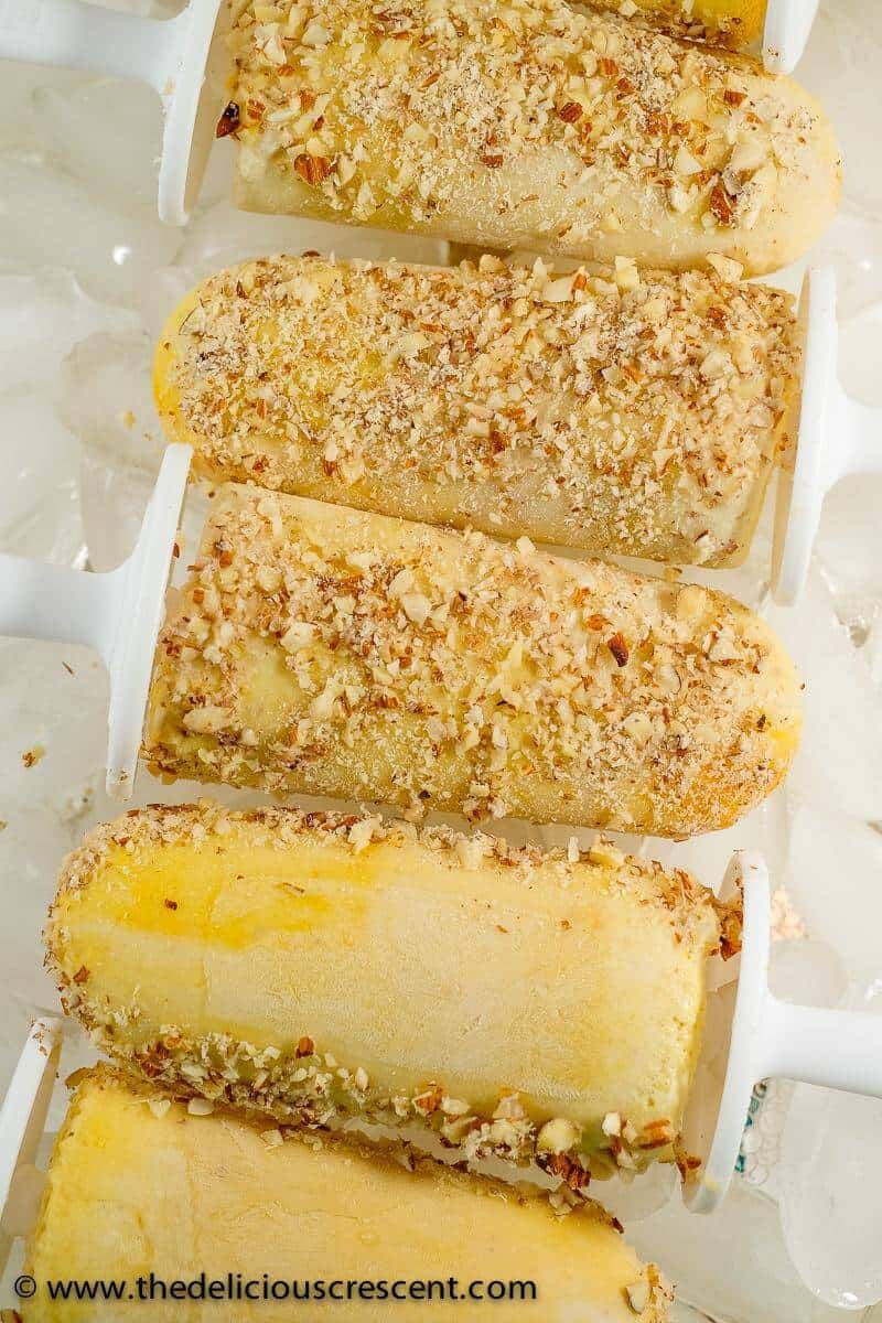Badam malai kulfi, a traditional Indian popsicle, amazingly easy recipe, with mouth watering creamy taste, fragrant flavors of almond, rose, saffron. With less added sugar and saturated fat but more protein. #kulfi #popsicle #glutenfree #dessert #Indianfood