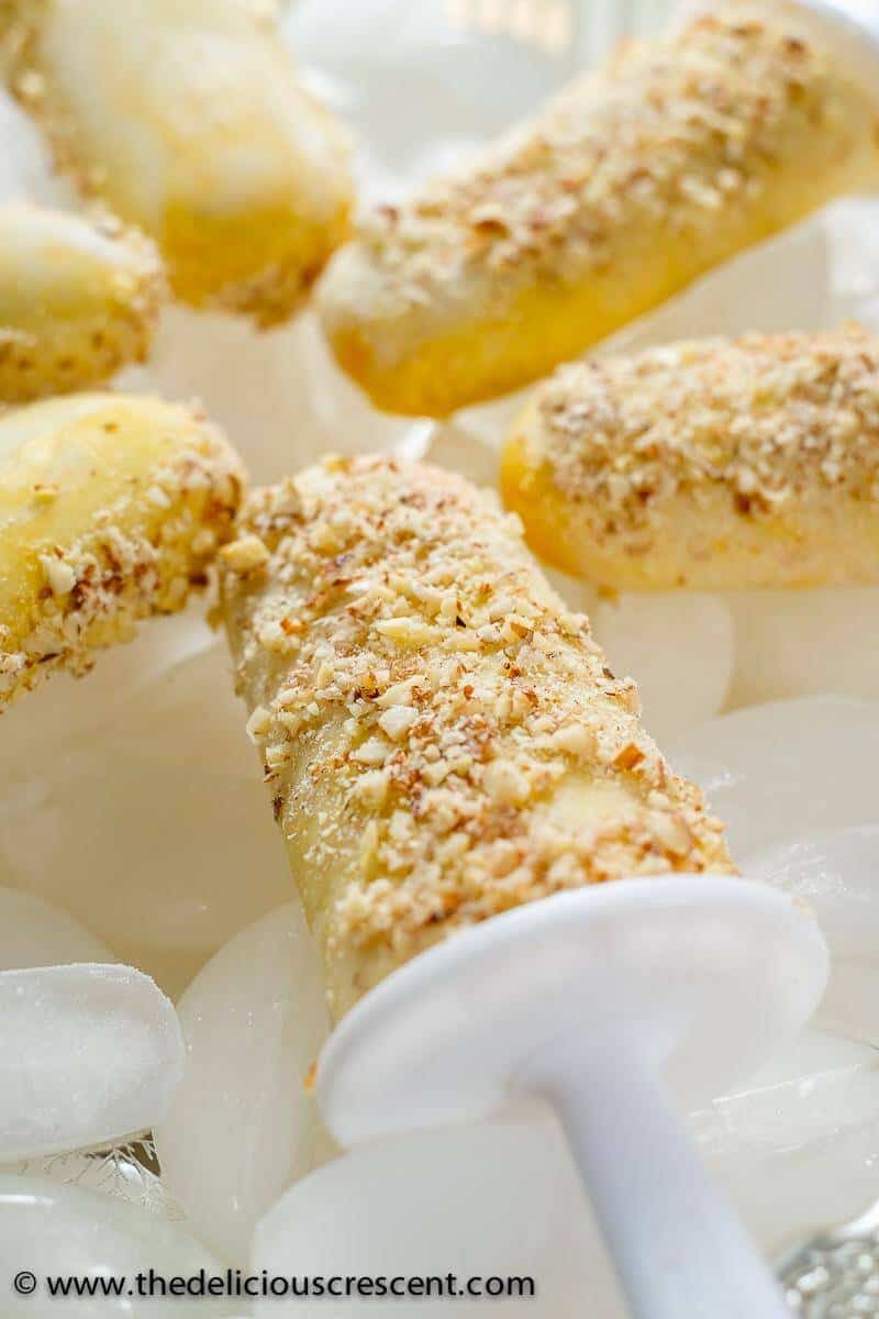 Badam malai kulfi, a traditional Indian popsicle, amazingly easy recipe, with mouth watering creamy taste, fragrant flavors of almond, rose, saffron. With less added sugar and saturated fat but more protein. #kulfi #popsicle #glutenfree #dessert #Indianfood