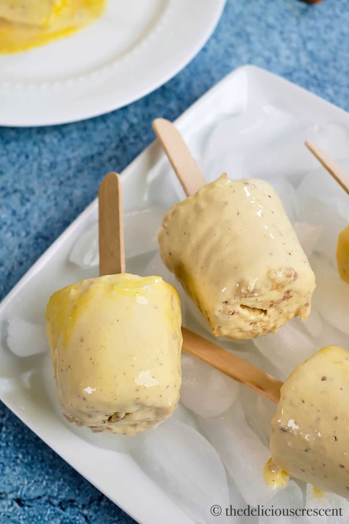 Easy kulfi made with almonds and served on a plate.