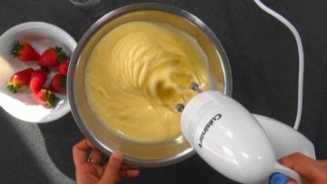 Whisking the eggs with sugar to a fine foam