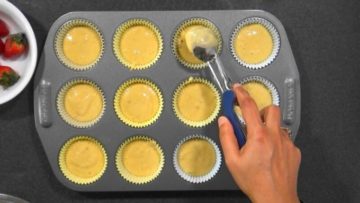 Filling the cupcake pan with the batter