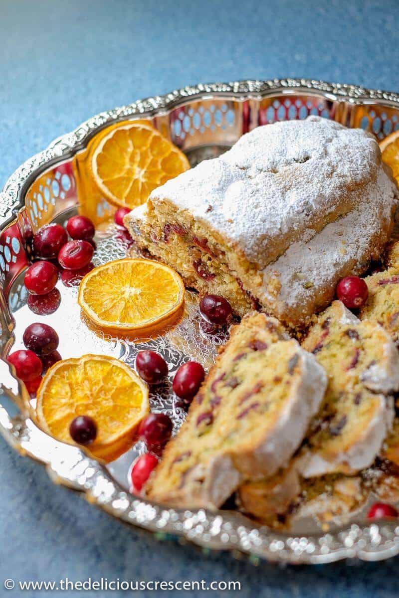 Slices of Cranberry Orange Quark Stollen with dried orange and cranberries