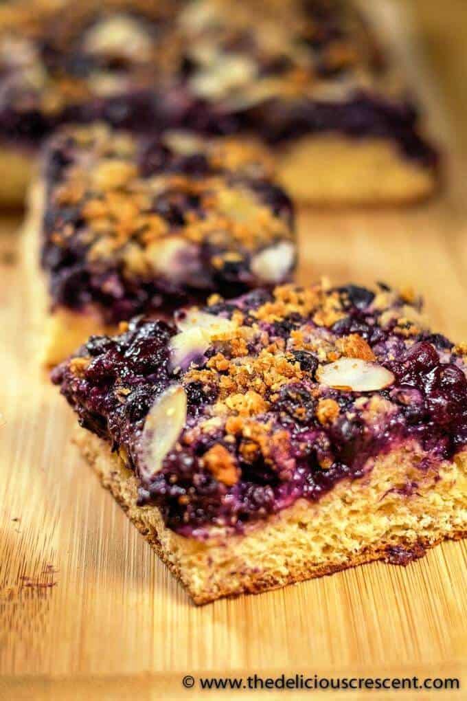 German blueberry bread cut into pieces.