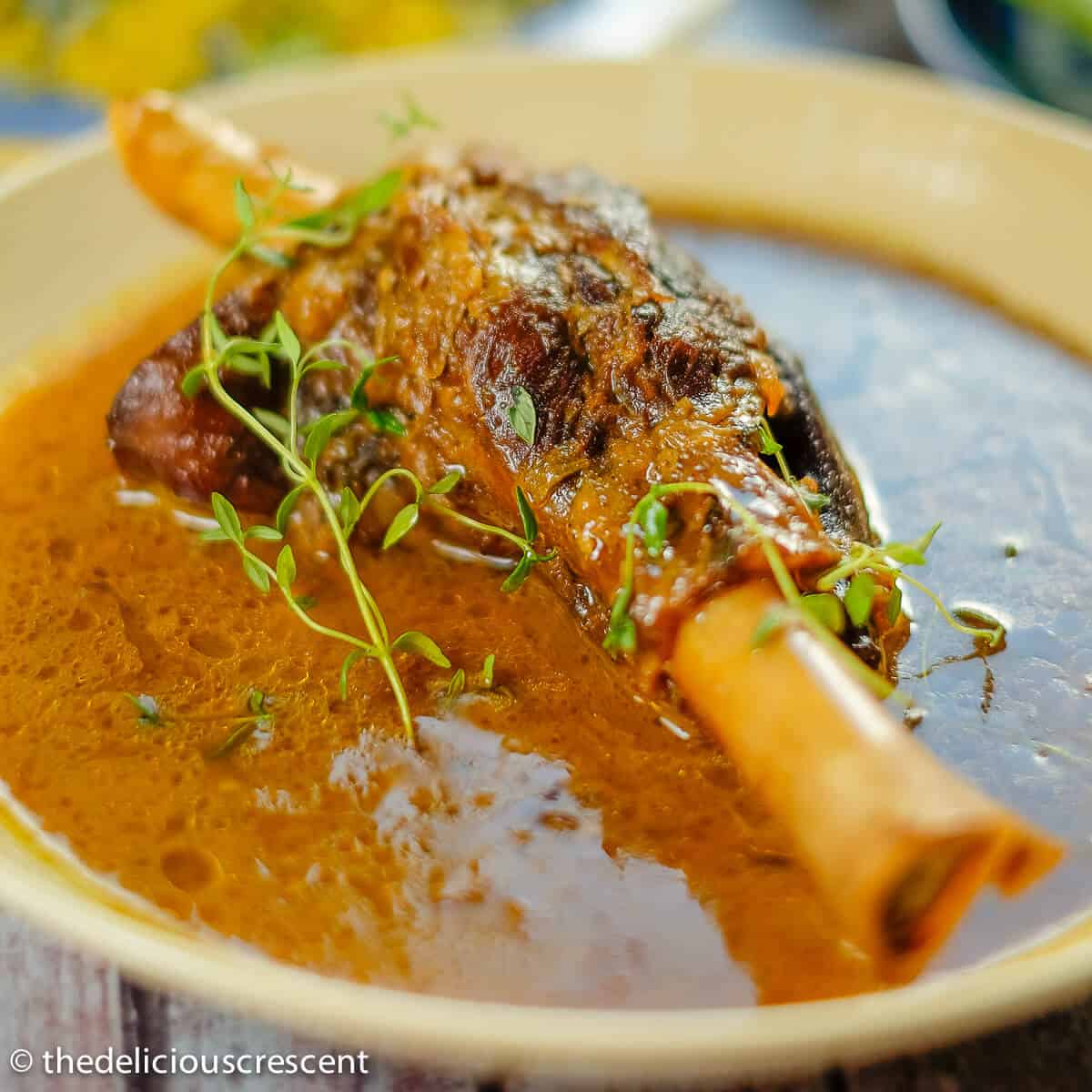 Braised Lamb Shanks Persian Style The Delicious Crescent