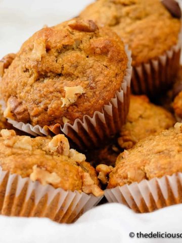 Oatmeal banana muffins placed in a basket.
