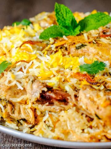 Chicken biryani served in a plate.