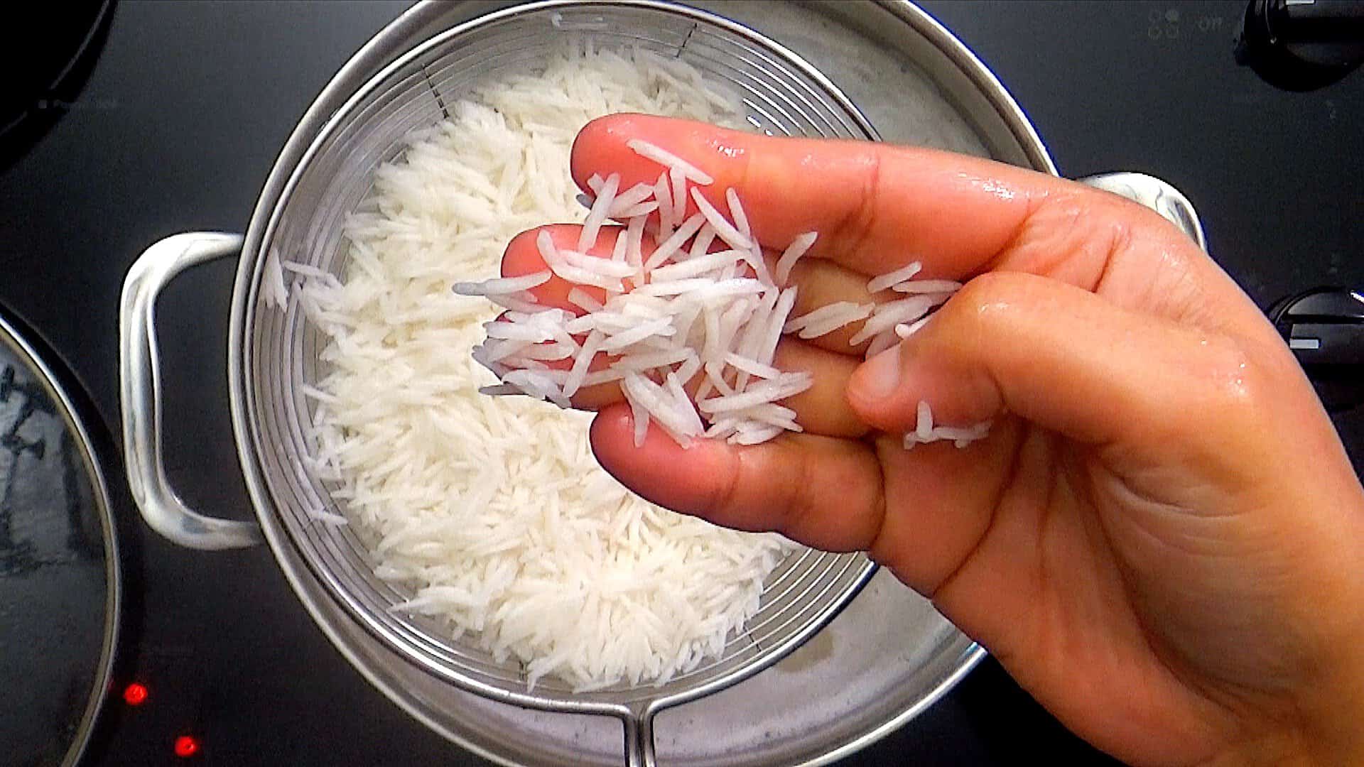 Traditional method of cooking rice.