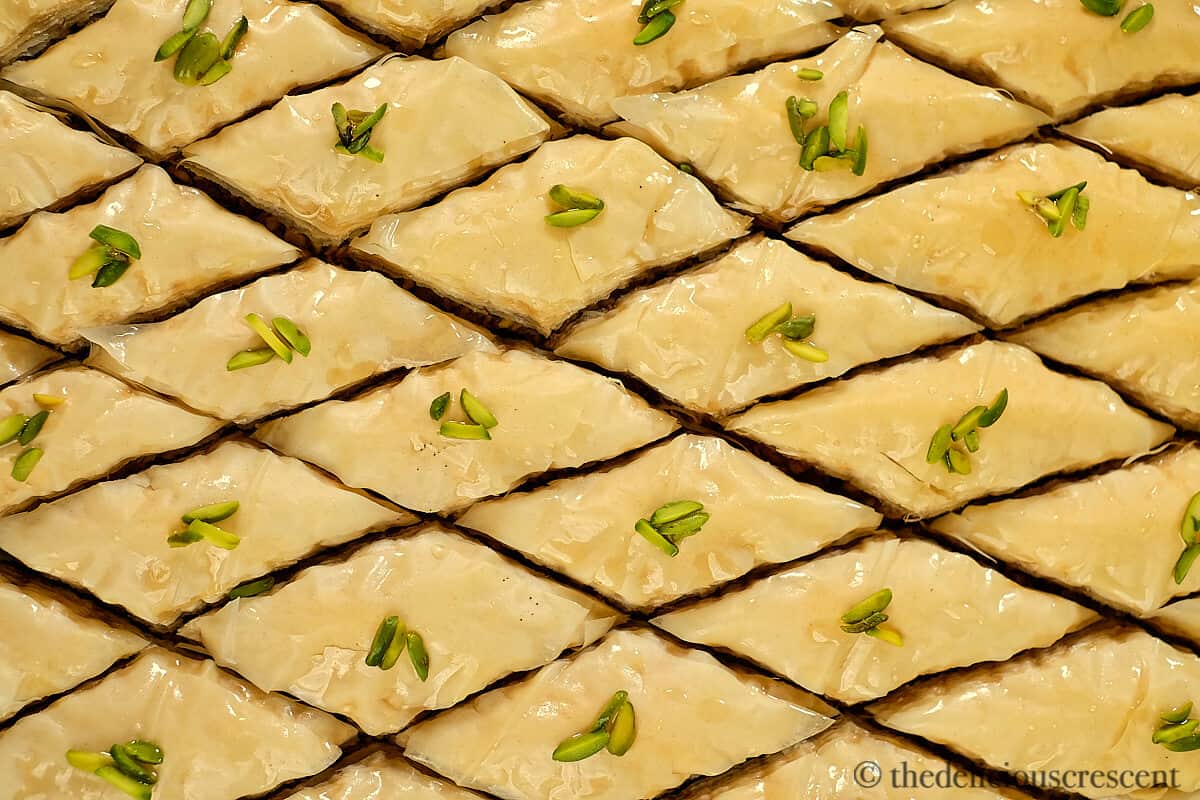 Close view of baklava pastry after adding the syrup.