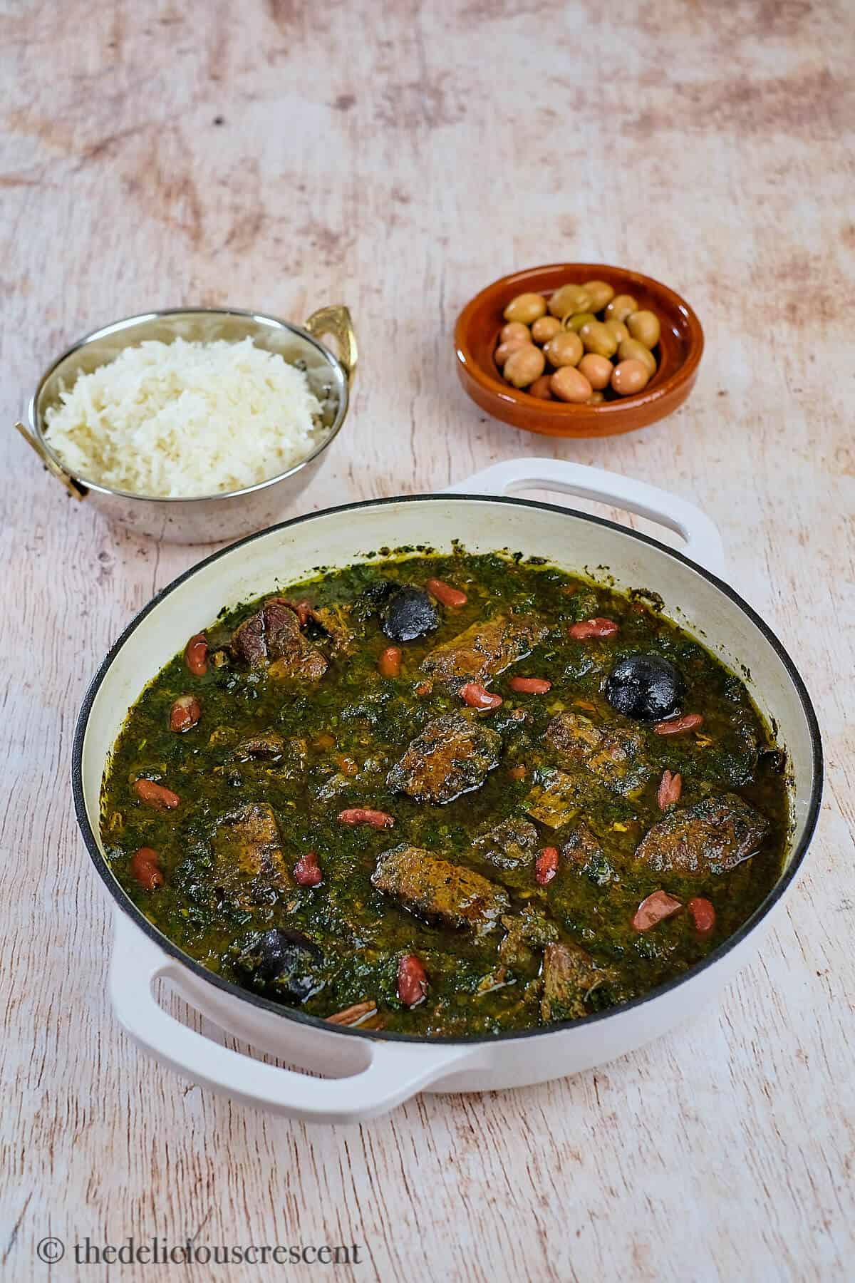 Ghormeh sabzi served in a dish.