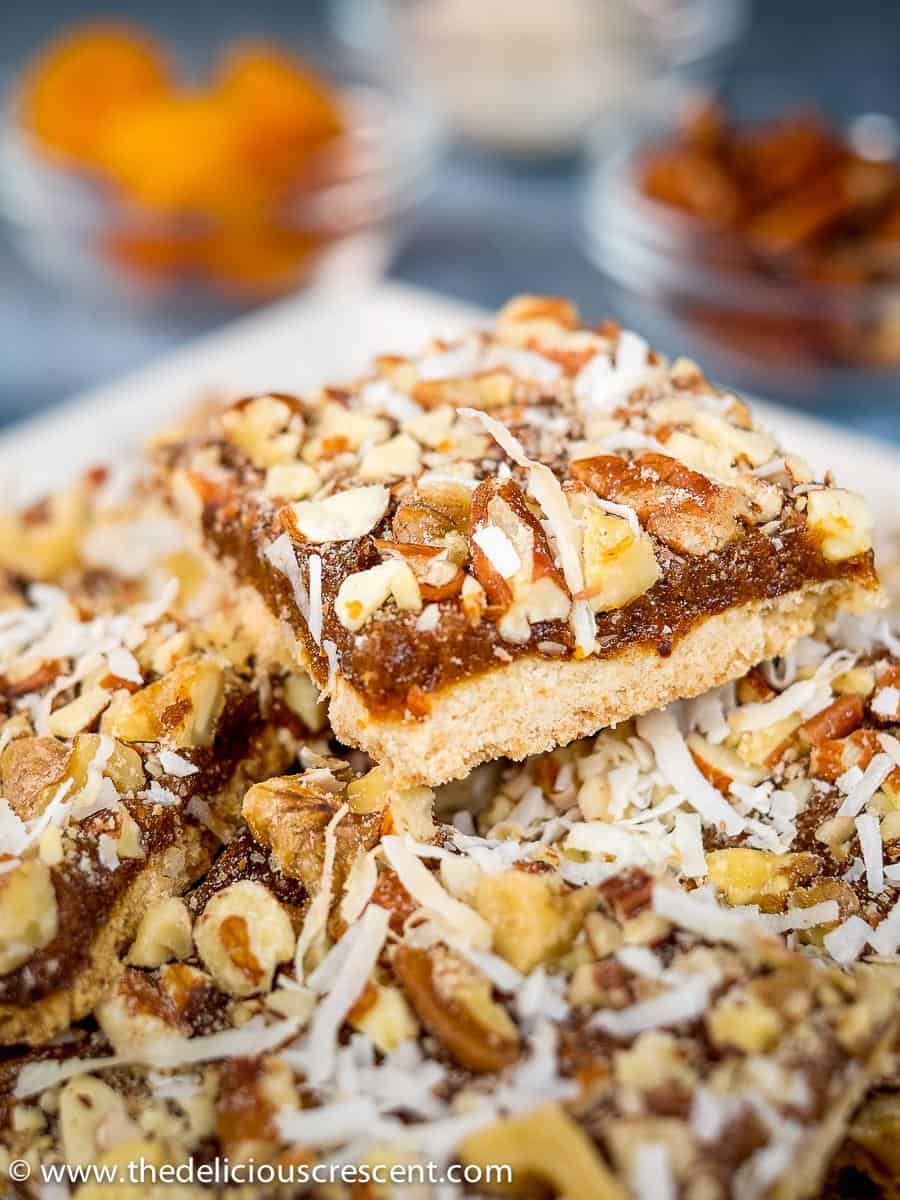 Date bar cookies arranged on a plate.