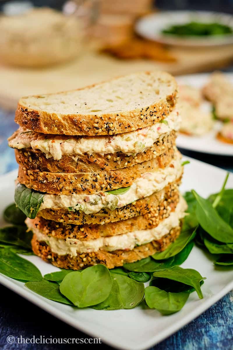 Close up view of a stack of tuna sandwiches made with chipotle.