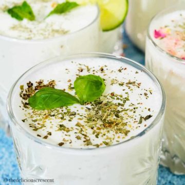 Doogh, Persian yogurt drink served in glasses.