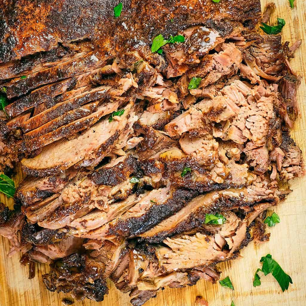 Close up view of shredded meat that had been marinated with middle eastern spices and then roasted.