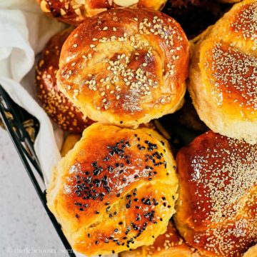 Soft honey wheat rolls served in a basket.