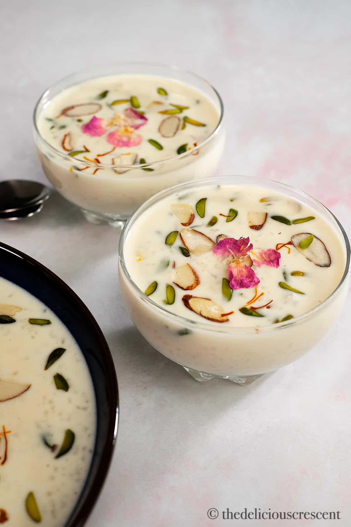 Indian rice pudding in two small bowls.