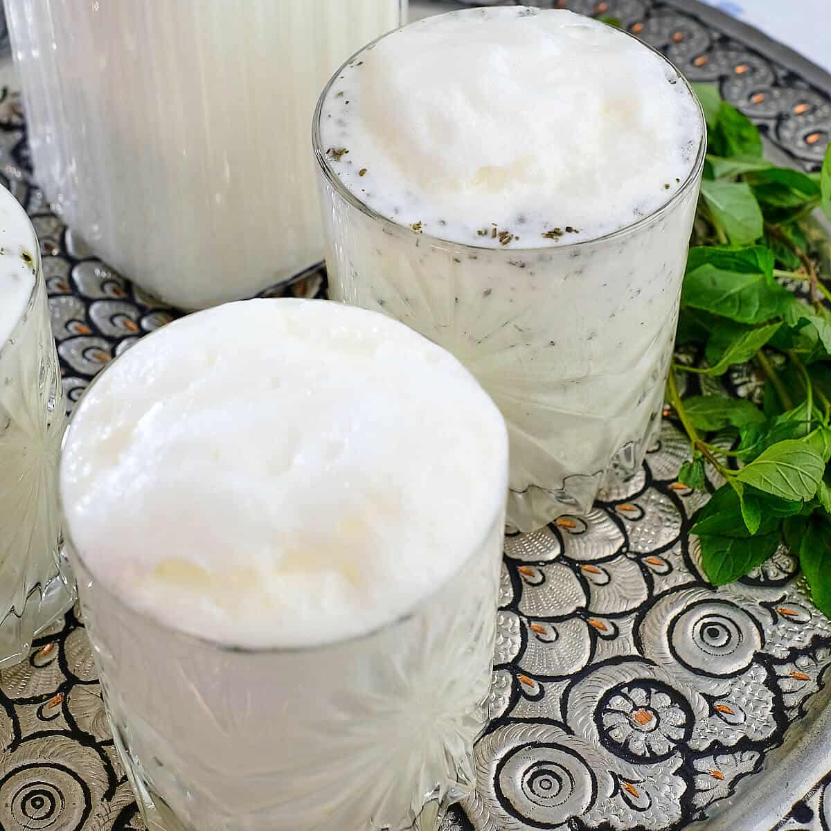 Two glasses will of Ayran drink.
