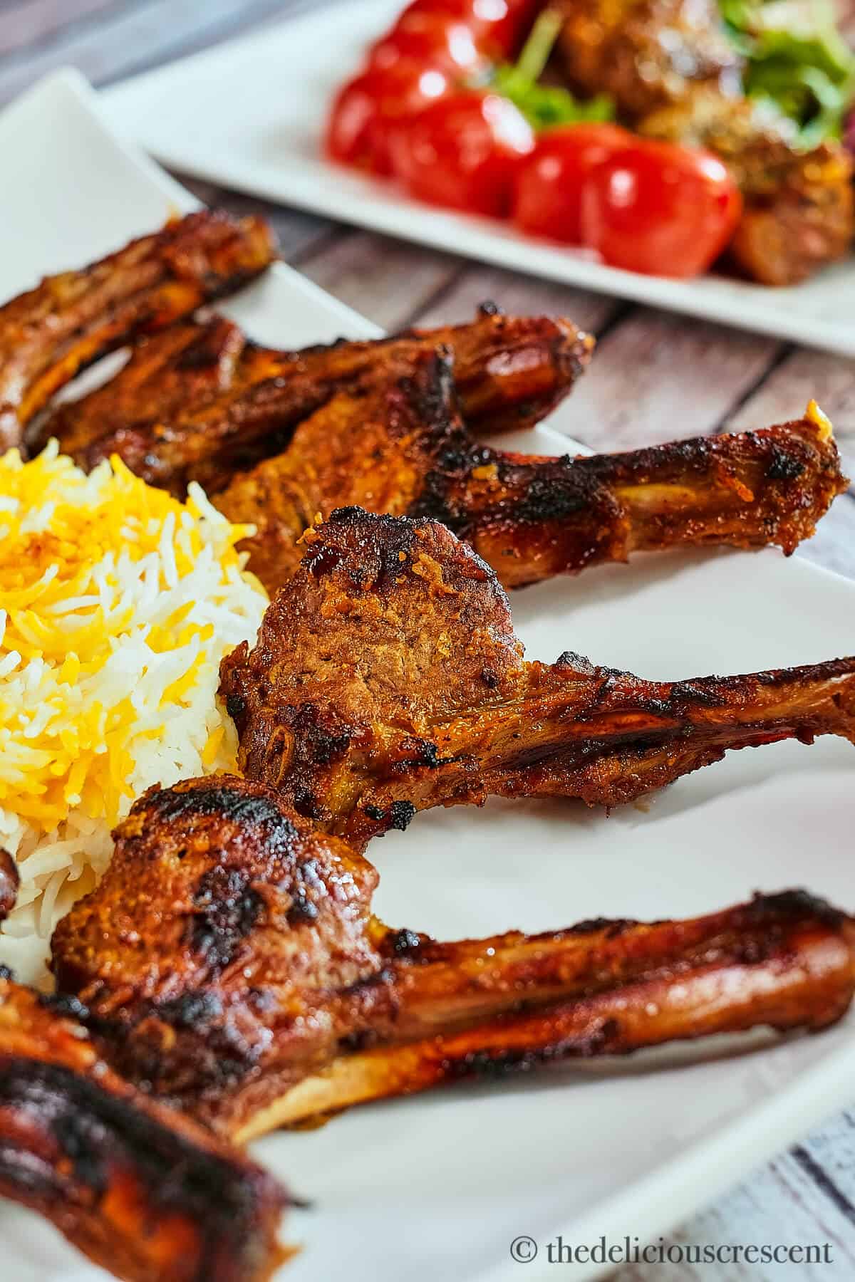 Persian style lamb rib chops with rice.