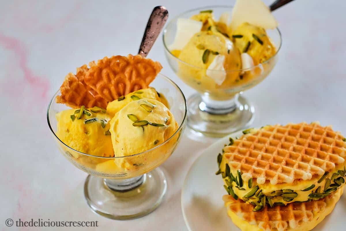 Persian ice cream as scoops and as waffle sandwich.