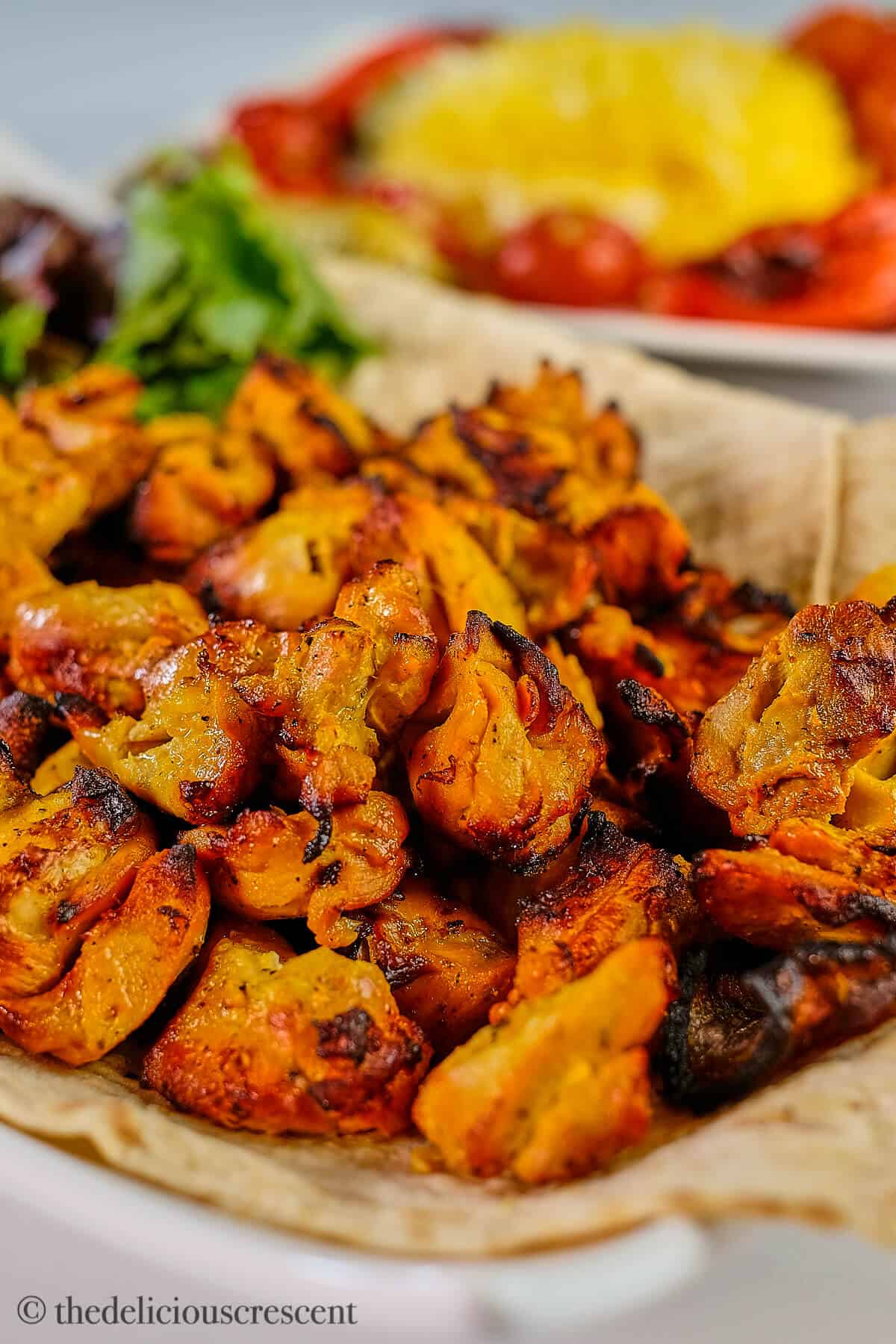 Jujeh kababs served on a plate.