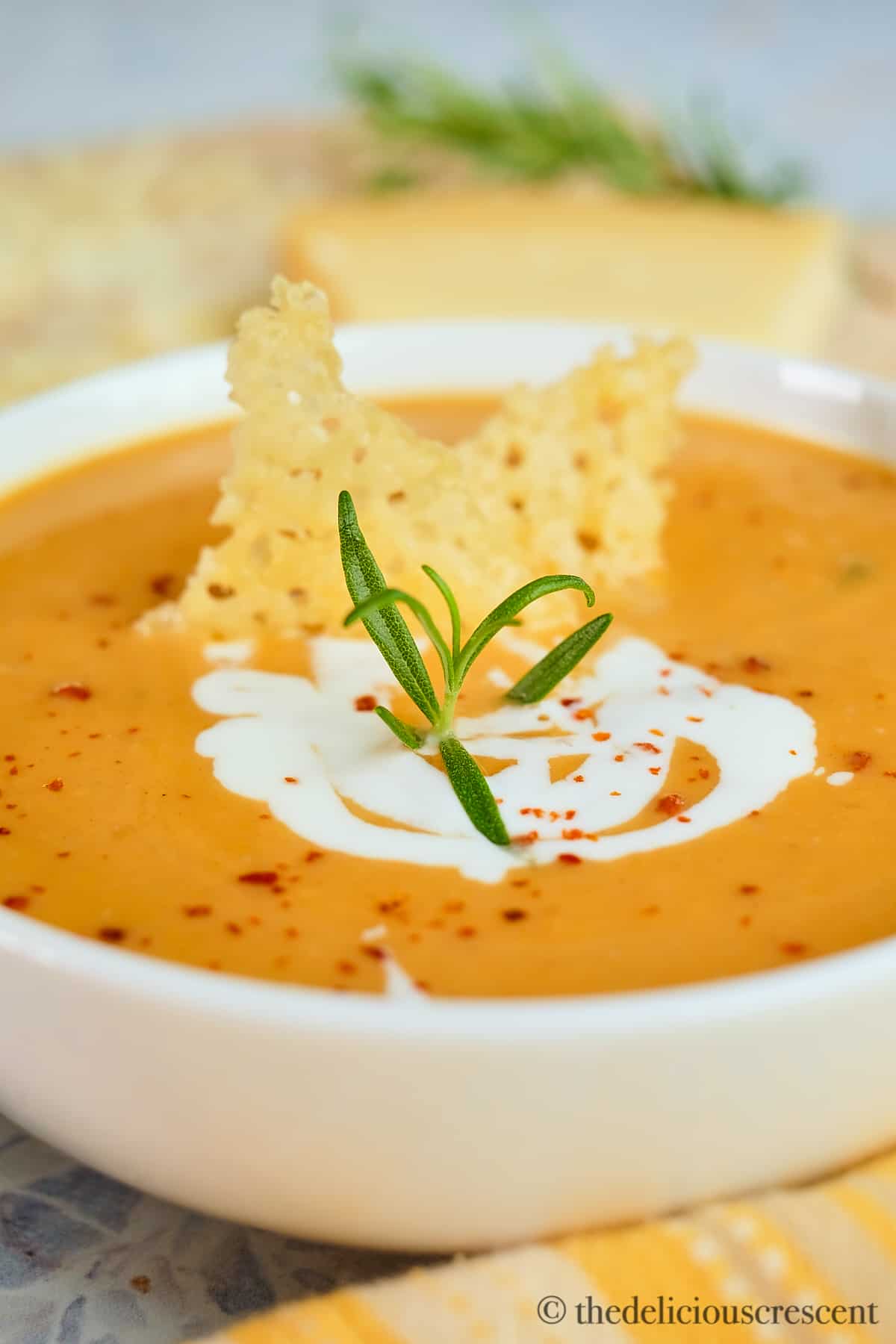 Sweet potato soup made with coconut milk and topped with parmesan crisps.